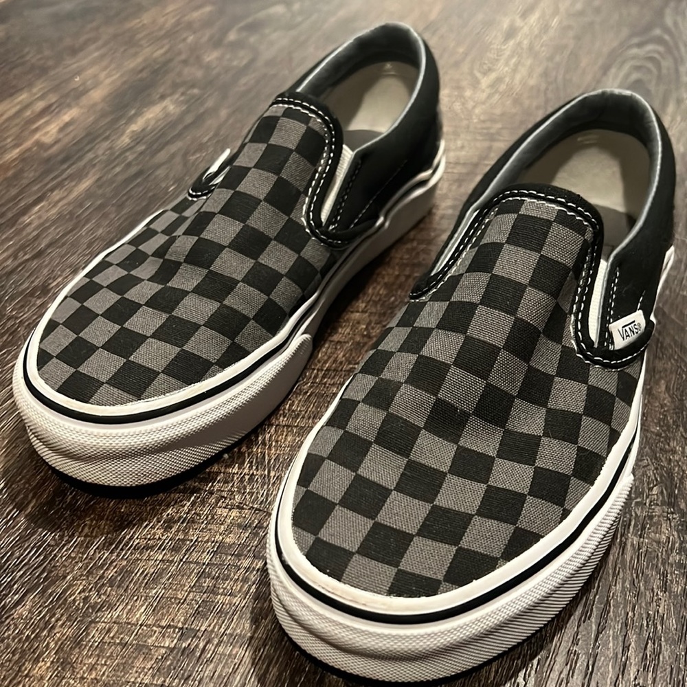 Checkered black and grey vans